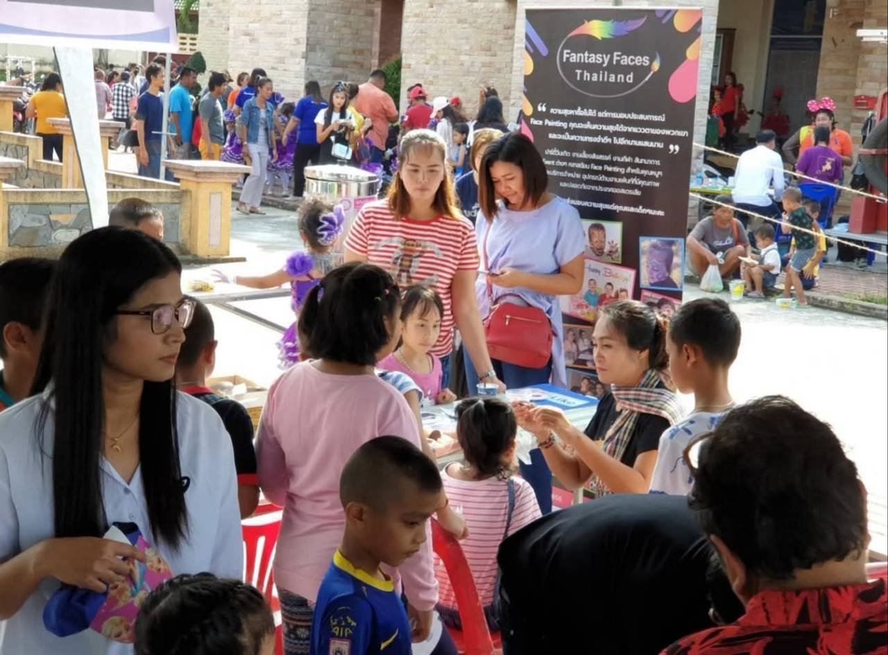 Fantasy Faces Thailand, lamp.charity's face painters, at a community day &mdash; 4 of 5