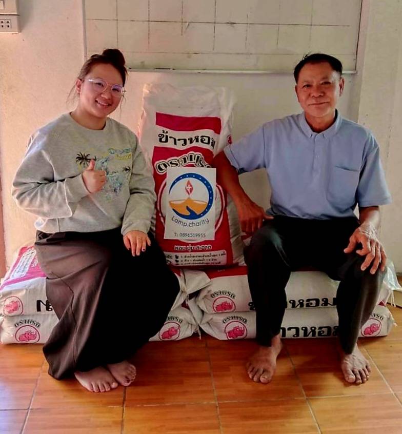 Sacks of jasmine rice, labelled lamp.charity, ready for delivery